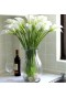 18 white calla in vase
